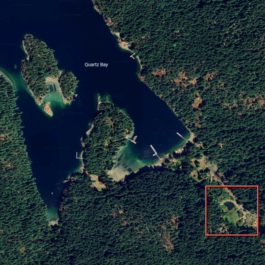 Aerial view of Quartz Bay and the location of the freshwater pond.